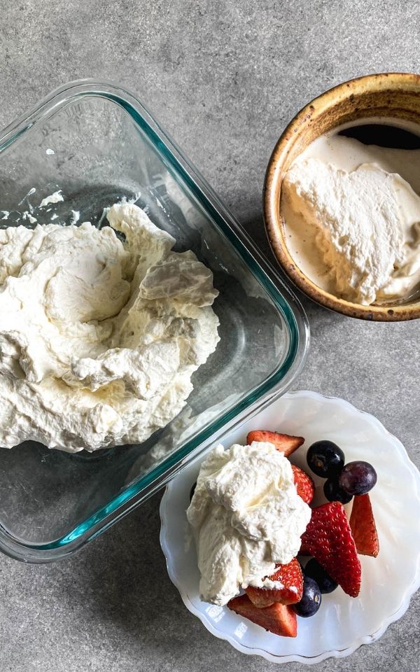 whipped cream served on top of berries and coffee