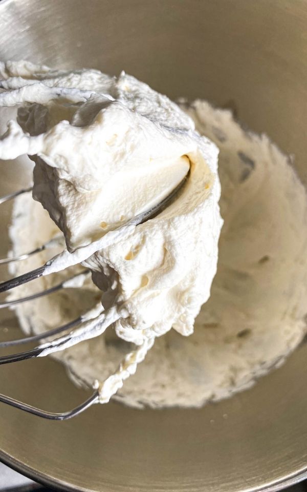 whisk filled with easy from-scratch whipped cream