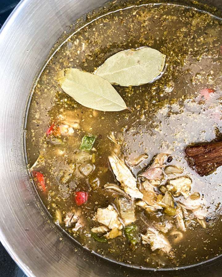 stock pot of simmering turkey and white bean chili verde