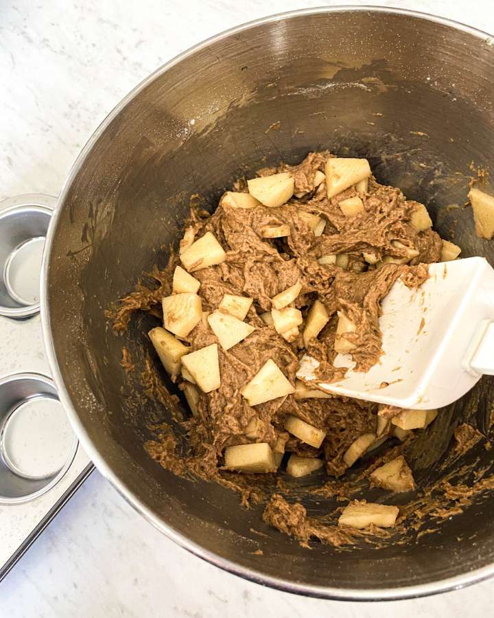 sourdough apple spice muffin batter in a stainless bowl